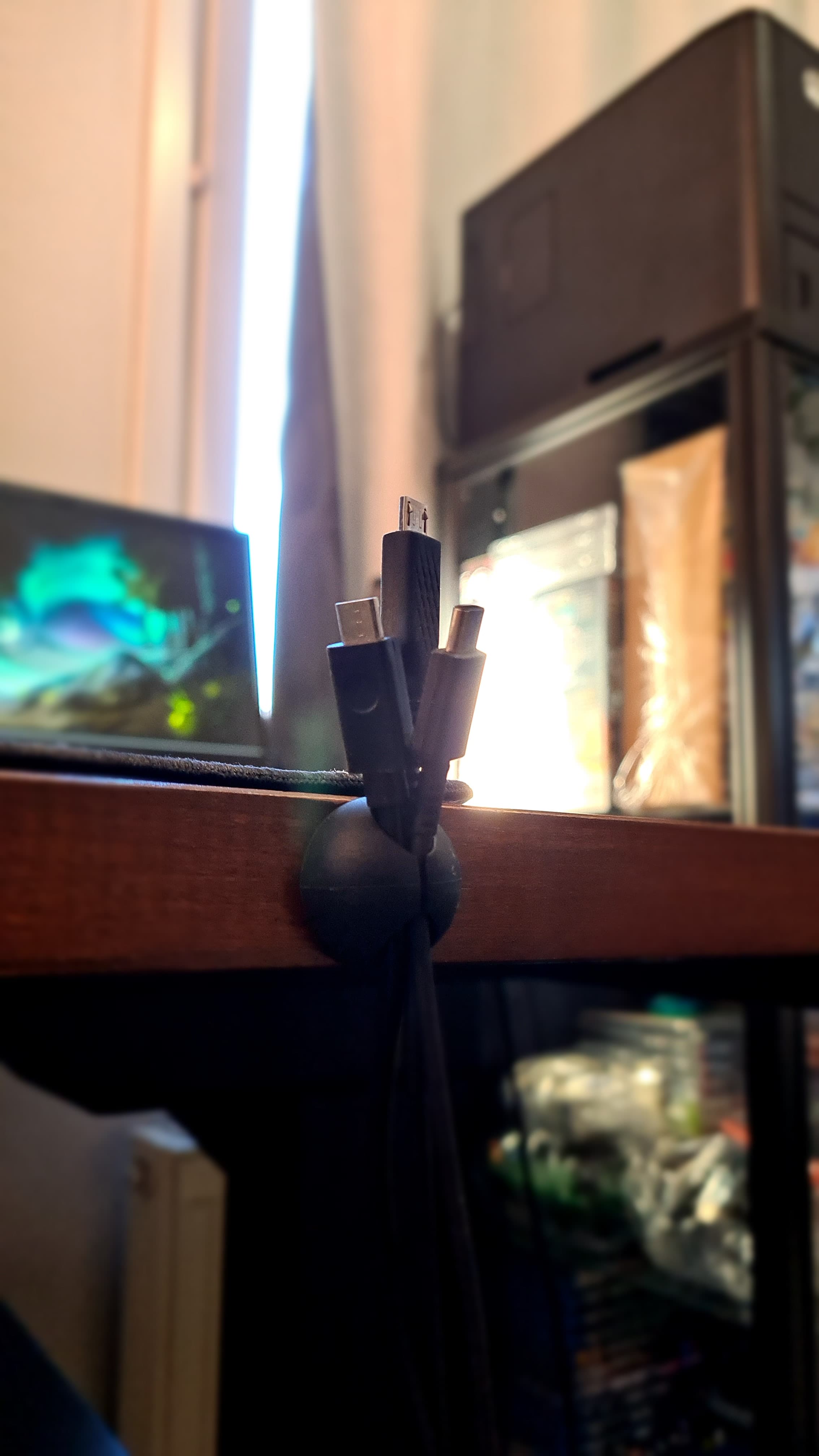 Cable holder managing chargers and cables