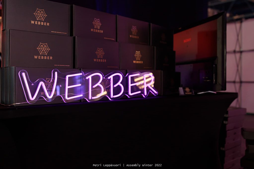 Webber neon sign with product packages on Assembly winter 2022